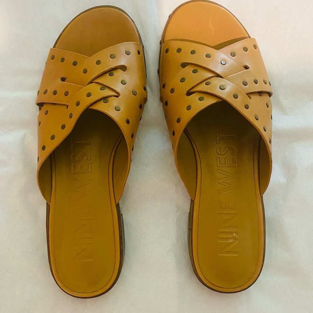 Nine West slip on light cognac leather shoe. Worn once.